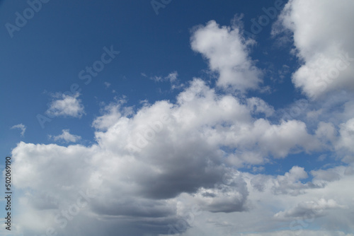 Blue sky background with clouds.Beautiful summer sky. © Александр Поташев