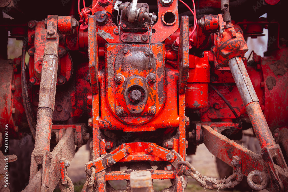 Tractor engine close up. Agriculture, field work, spring, summer. Background. Technically a device for a loft painting Tractor engine close up. Agriculture, field work, spring, summer. Background. Technically a device for a loft painting