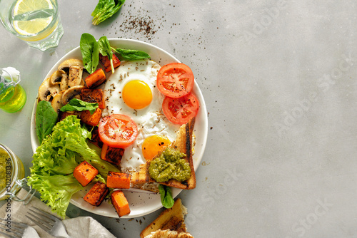 Breakfast table Breakfast plate fried eggs vegetables mushrooms toast top view healthy table copy space