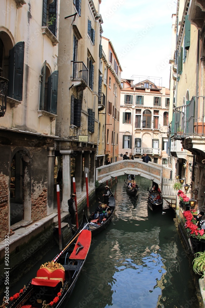 Italy, Veneto: Gondolas in the canal of Venice.