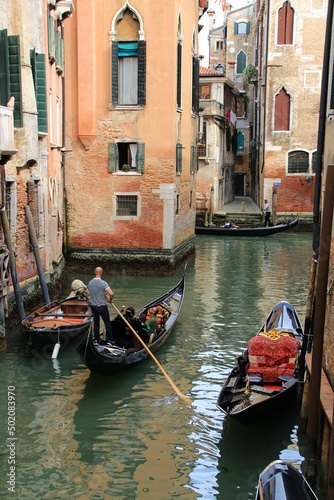 Italy, Veneto: Gondolas in the canal of Venice.