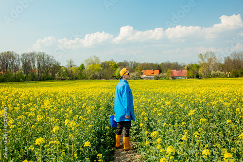 Ukrainian woman in rapeseed field