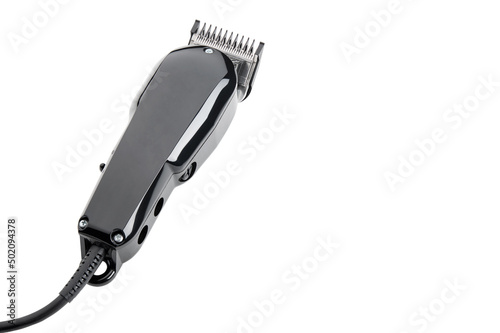 Hair clipper. Professional barber hair clipper for Men haircut. Hairdresser salon equipment. Premium hairdressing Accessories. Corded electric black hair clipper isolated on white background. photo