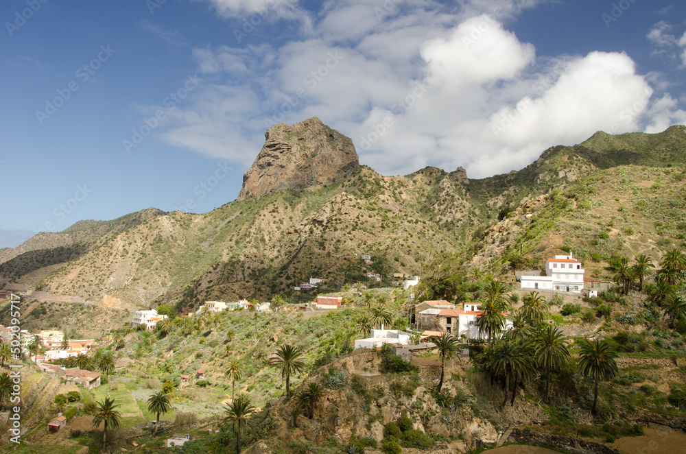 Cliff of Roque Cano and rural landscape. Vallehermoso. La Gomera. Canary Islands. Spain.