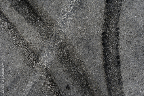 Wallpaper Mural Asphalt texture with white line and tire marks. Smooth asphalt road. Tarmac dark grey grainy road background.Top view Torontodigital.ca