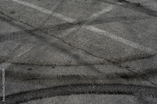 Wallpaper Mural Asphalt texture with white line and tire marks. Smooth asphalt road. Tarmac dark grey grainy road background.Top view Torontodigital.ca