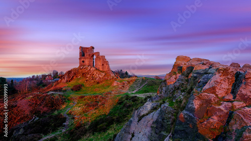 Winter golden hour light on Mow Cop Castle folly, Cheshire, UK photo