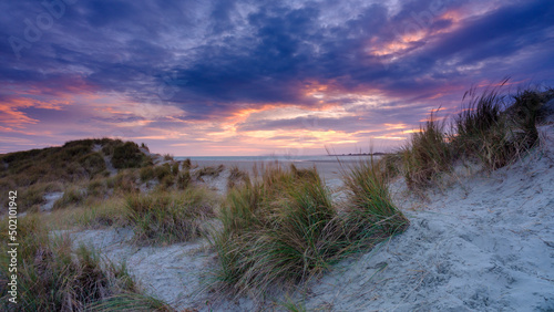 Winter sunset on the dunes of East Head in the Chichester Harbour AONB, West Sussex