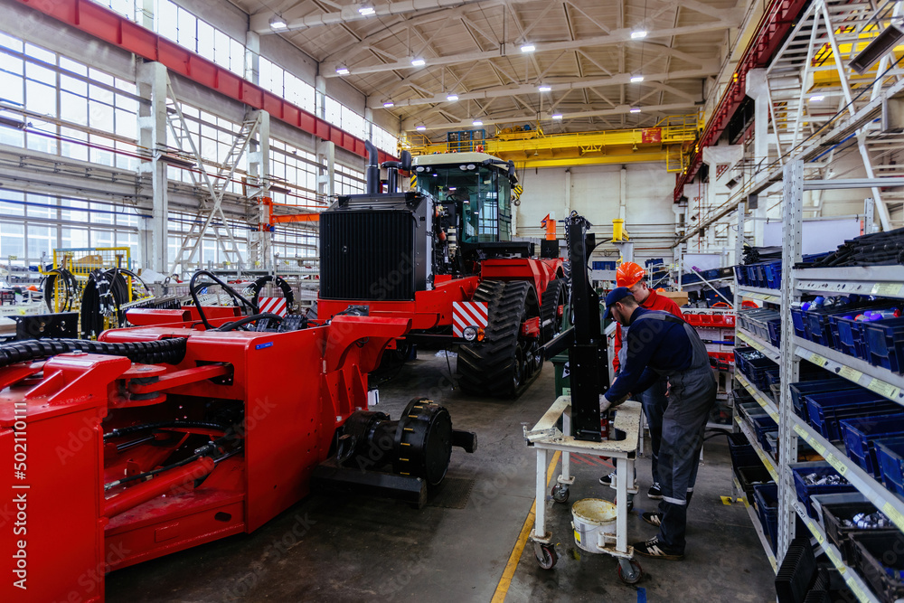 Assembly process of agricultural tractors in industrial workshop Assembly process of agricultural tractors in industrial workshop