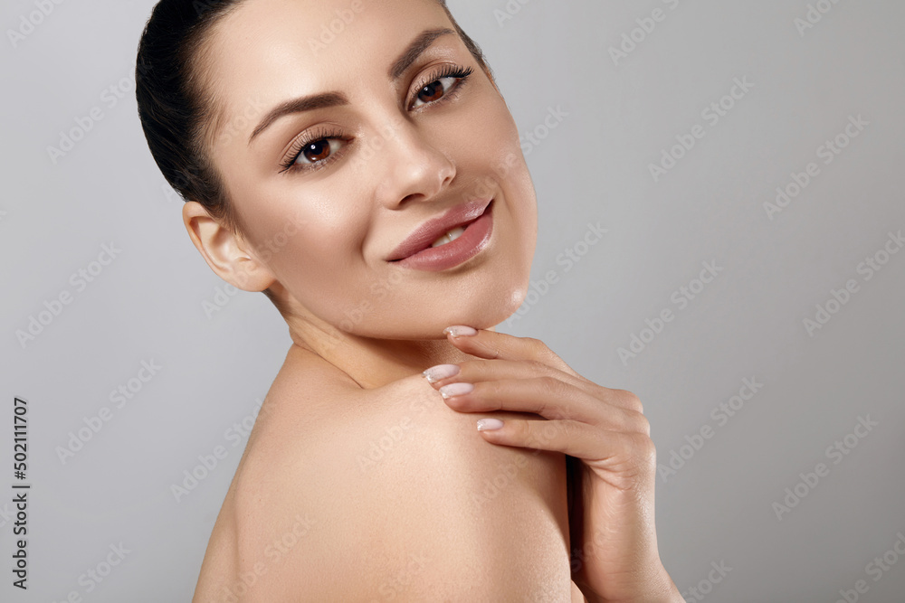 Beauty woman healthy skin concept natural makeup beautiful model girl face hands touching with manicure nails. Facial treatment Beauty woman healthy skin concept natural makeup beautiful model girl face hands touching with manicure nails. Facial treatment