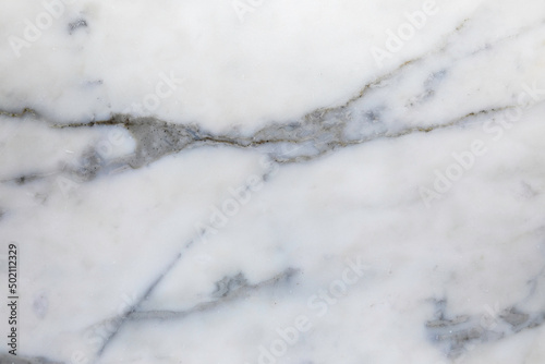 Fancy luxurious Italian Calacatta marble tile background design element with copy space. © AZ Images
