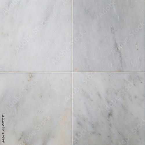 Fancy luxurious Italian Carrara marble tiles background design element with copy space.