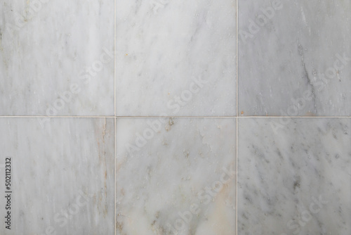 Fancy luxurious Italian Carrara marble tiles background design element with copy space.