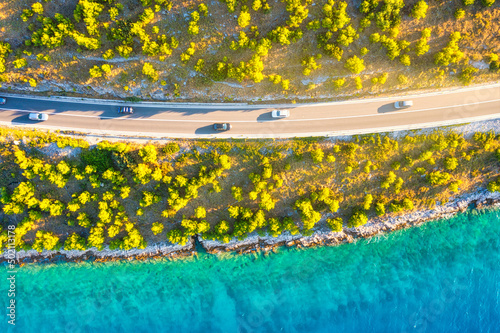 View of the road along the coast from the drone. Travel by car in summer time...