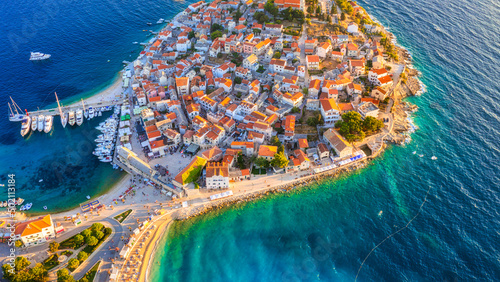 Primosten town, Croatia. View of the city from the air. Seascape with beach and old town. View from drone on the peninsula with houses. Travel and vacation image photo