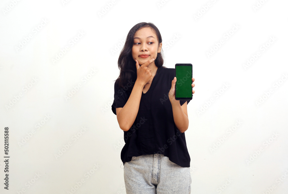 Cute young asian woman showing a blank screen. Isolated on white background Cute young asian woman showing a blank screen. Isolated on white background