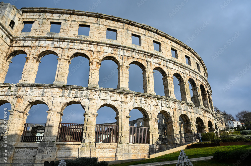 Pula, Istria, Croatia: Ancient amphitheater from Roman era in city centre. Monument. Cultural heritage and famous landmark. Pulska Arena