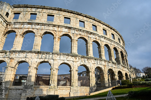 Pula, Istria, Croatia: Ancient amphitheater from Roman era in city centre. Monument. Cultural heritage and famous landmark. Pulska Arena