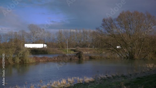 The flooded river valley (Seacourt Stream) next to the A34 main road in Oxford photo