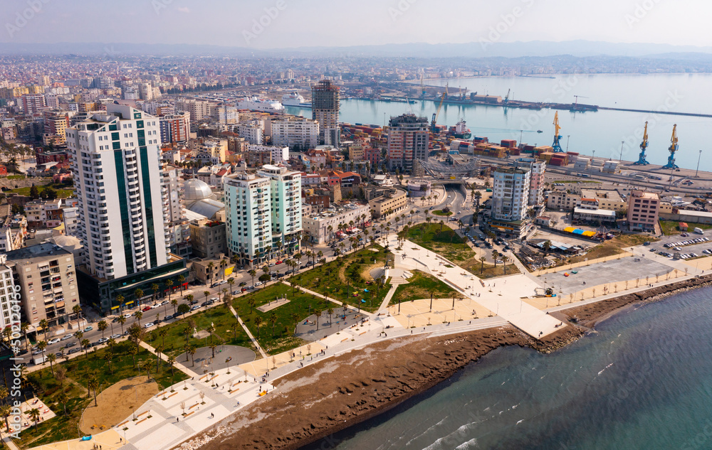Picturesque aerial view of seaside area of Albanian city of Durres on coast of Adriatic Sea with modern high-rise buildings 