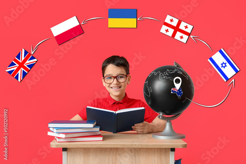 Cute little schoolboy with ...