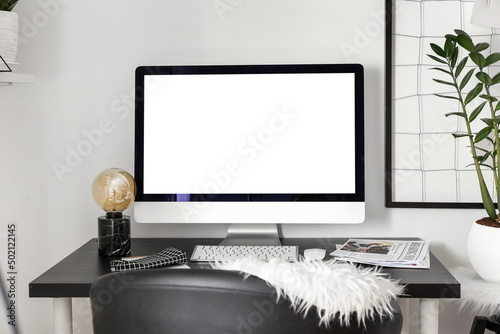 Workplace with modern compu...