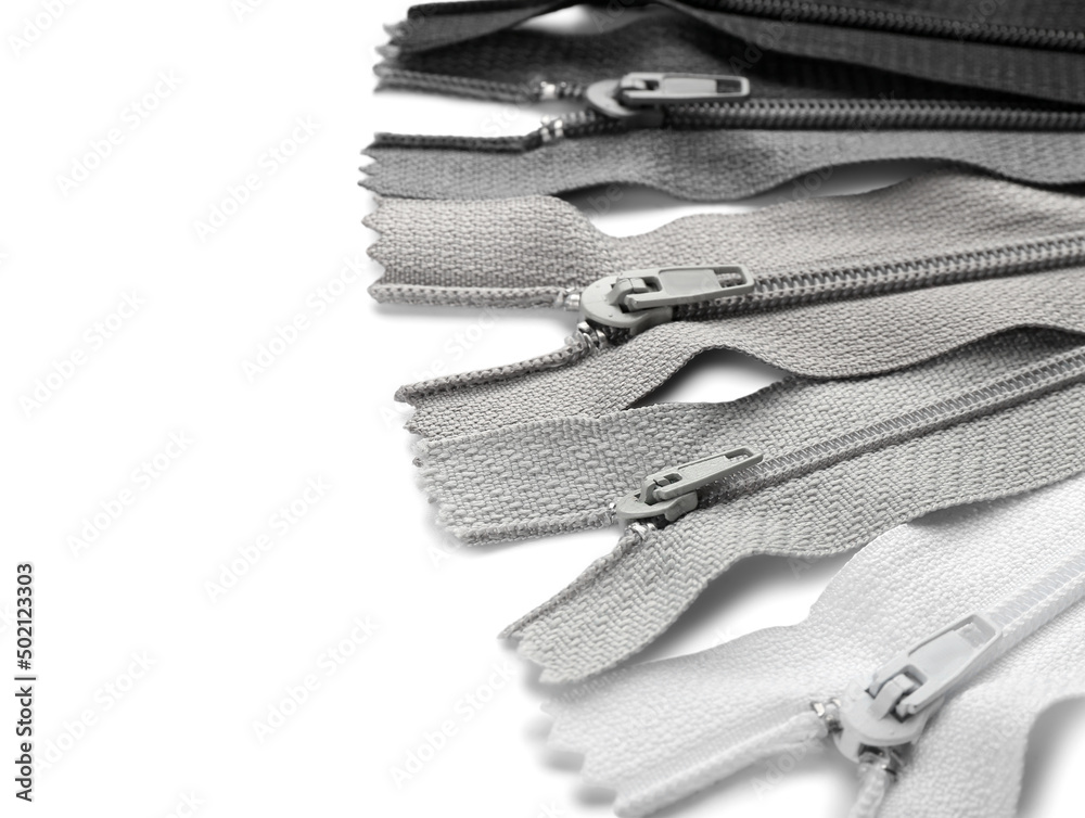Stylish different zippers on white background Stylish different zippers on white background