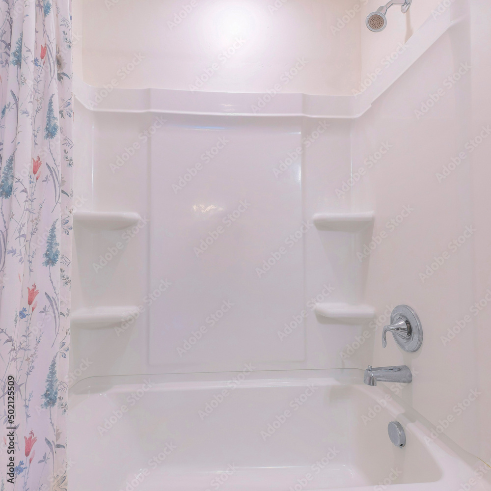 Square Alcove tub shower combo kit with acrylic wall panel Stock Photo