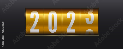 Transition of New year from 2022 to 2023. Mechanical scoreboard in vintage style.