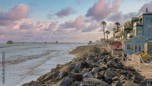 Panorama Puffy clouds at sunset Beach at the coastal area of Oceanside in California with a view