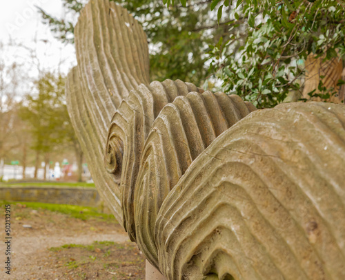 Wooden carved fugure in public park in Vancouver. photo