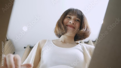 female unpack online parcel at home