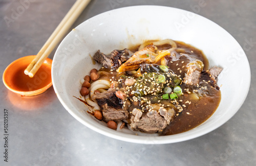 Seremban beef noodle with thick gravy, popular food in Malaysia photo