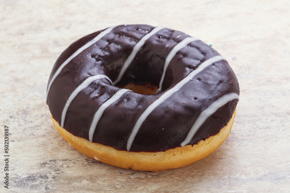 Glazed sweet tasty chocolate donut