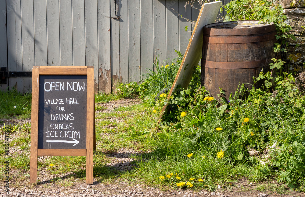 Naklejka premium old information blackboard shop sign with directions and menu for village hall fete and visitor center