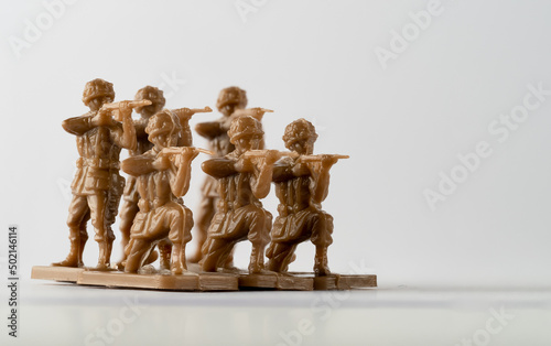 platoon American service personell paratroopers in toy soldier form brown shooting photo