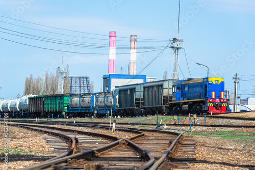 Freight train on the territory of the plant, industrial zone.