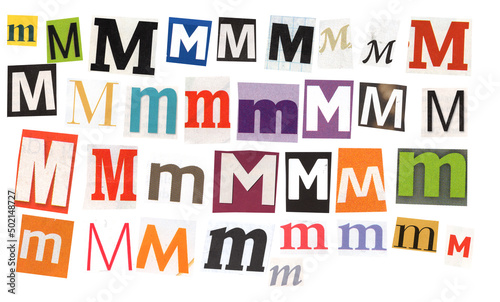 letter m magazine cut out font, ransom letter, isolated collage elements for text alphabet. hand made and cut, high quality scan. halftone pattern and texture detail. newspaper and scraps