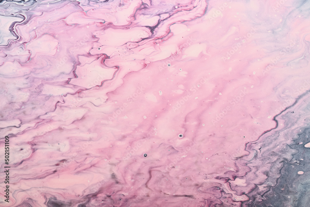 Fluid Art. Pink abstract wave swirls. Marble effect background or texture