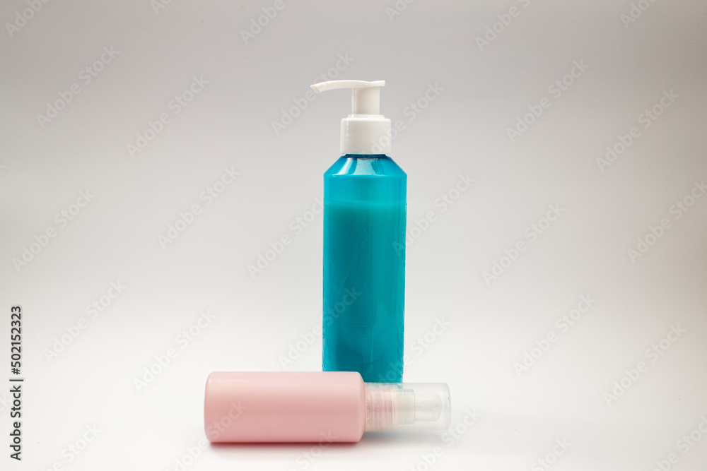 Blue can of shampoo on a white background Blue can of shampoo on a white background