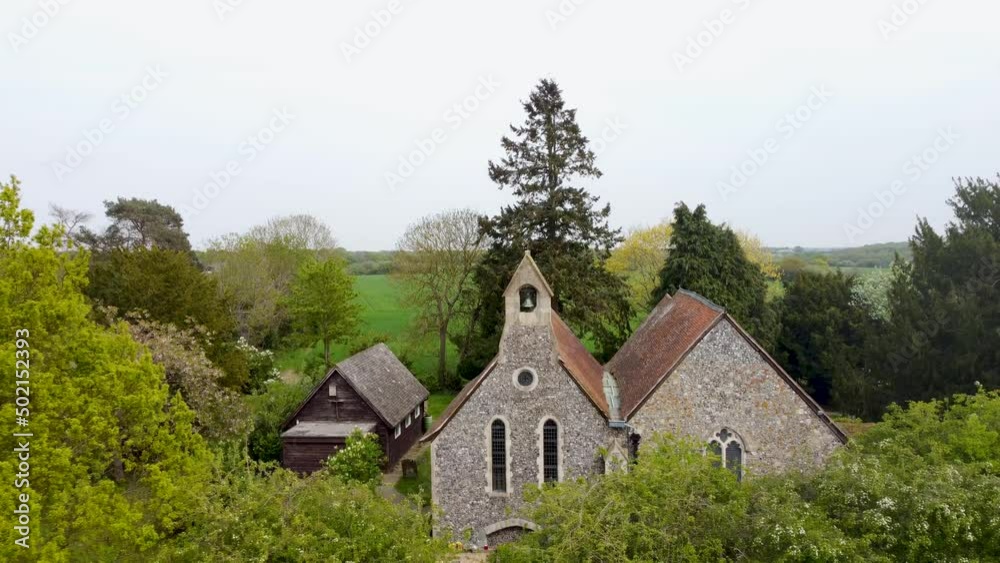 Drone descending to reveal a medieval church near Canterbury England it is Blean church Drone descending to reveal a medieval church near Canterbury England it is Blean church
