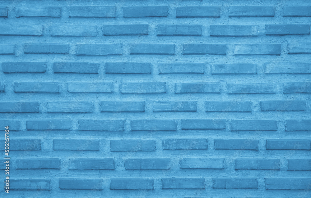 Brick wall painted with blue dark paint pastel calm tone texture background. Brickwork and stonework flooring interior design stack backdrop. Brick wall painted with blue dark paint pastel calm tone texture background. Brickwork and stonework flooring interior design stack backdrop.