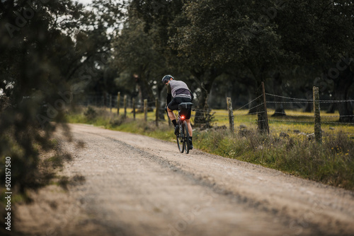 Wallpaper Mural Cyclist riding bicycle with bikepacking on road Torontodigital.ca