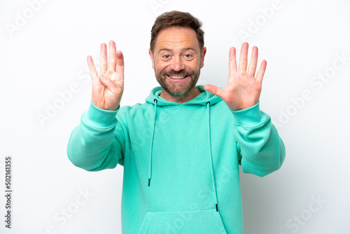 Middle age caucasian man isolated on white background counting nine with fingers © luismolinero
