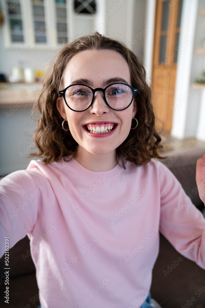 Cheerful woman with eyeglasses at home Cheerful woman with eyeglasses at home