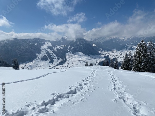 Wonderful winter hiking trails and traces on the slopes of the Alpstein mountain range and in the fresh alpine snow cover of the Swiss Alps, Nesslau - Obertoggenburg, Switzerland (Schweiz) © Mario