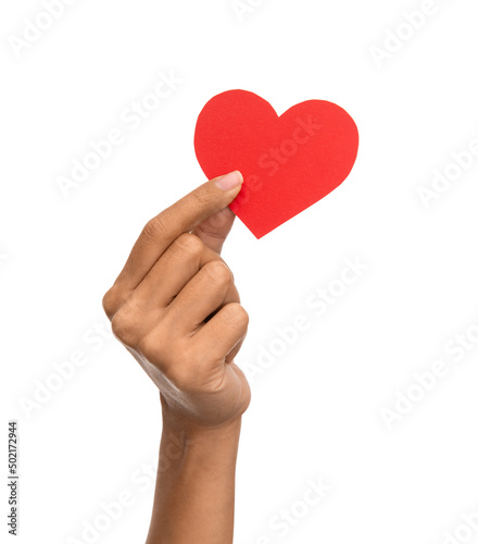 charity, love and health concept - close up of hand holding red heart over white background