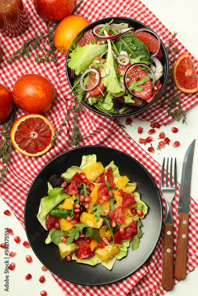 Concept of tasty food, salad with red orange, top view Concept of tasty food, salad with red orange, top view