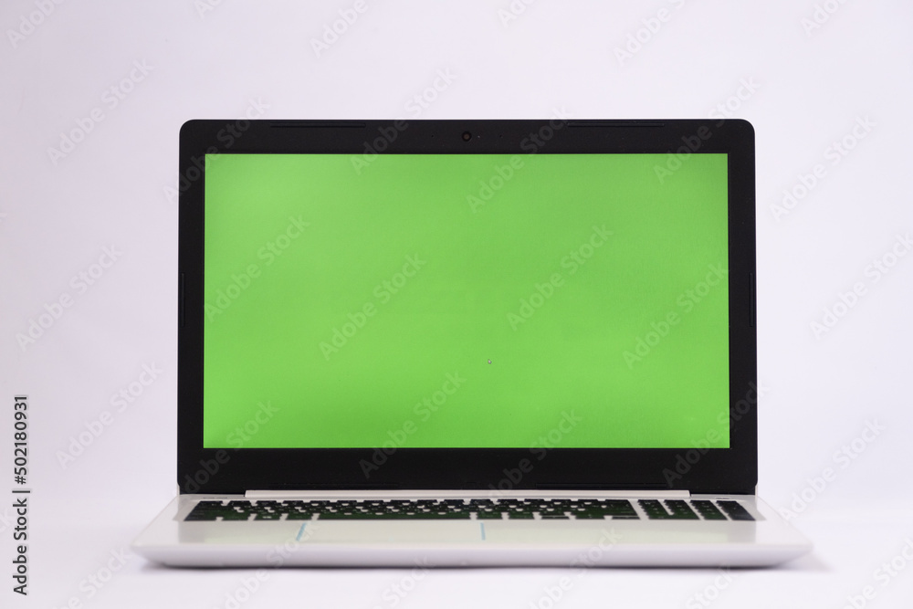 Laptop with green chroma key screen. Laptop on a white background Laptop with green chroma key screen. Laptop on a white background