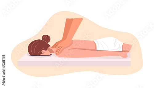 A woman getting a stretching massage